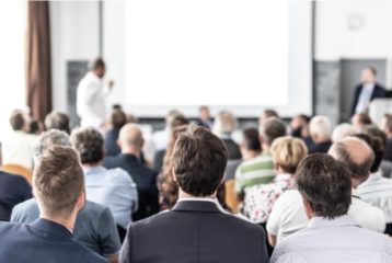 Speaker presenting at a veterinary conference